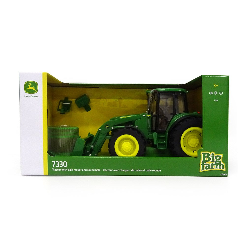 John Deere 7330 Tractor with Bale Mover and Round Bale