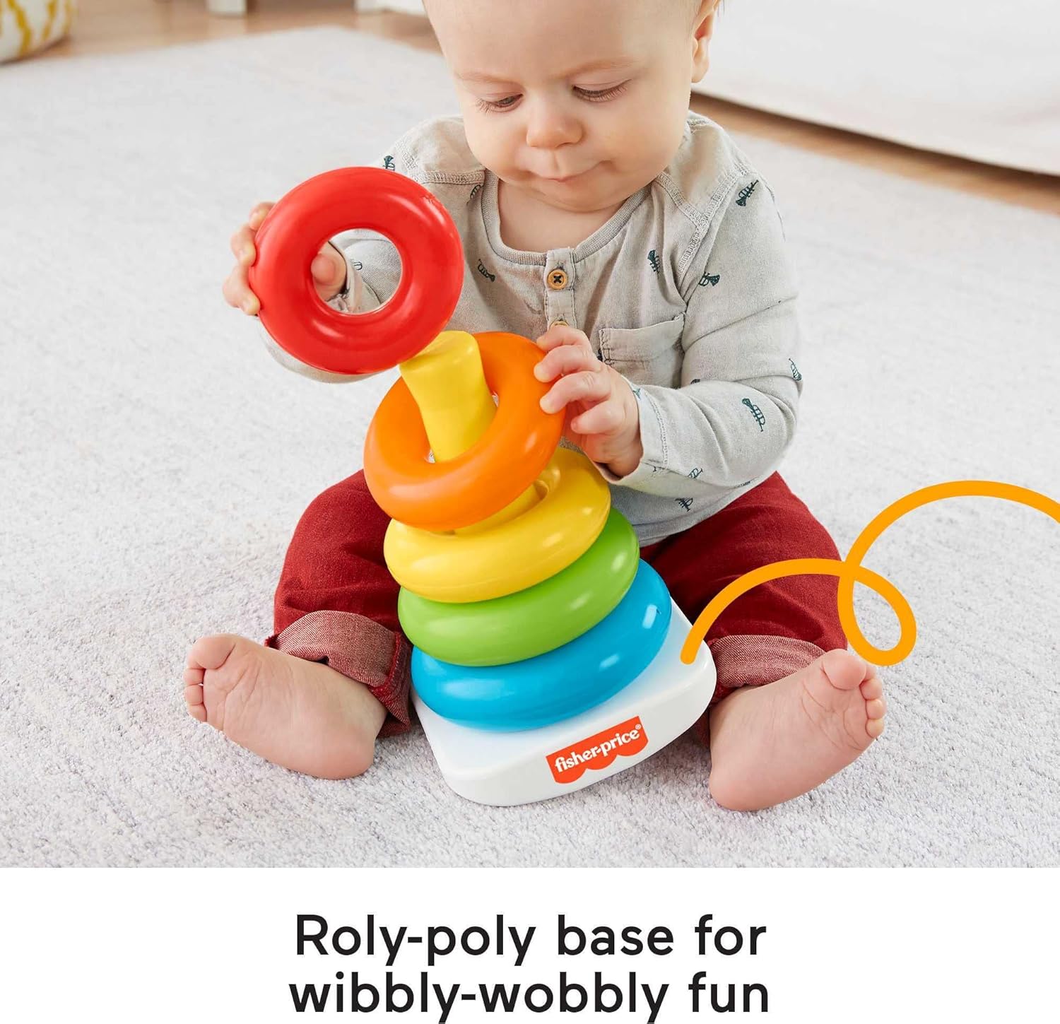 Child playing with Fisher Price Rock-a-Stack Toy