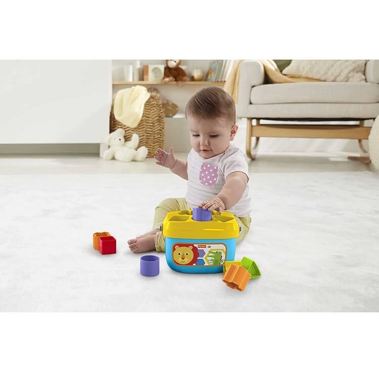 Child playing with Fisher-Price Babys First Blocks Toy